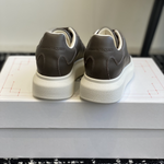 Alexander McQueen Oversized Brow Drip Sneakers