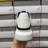 Alexander McQueen Black & White Drip Sneakers
