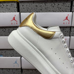 Alexander McQueen Gold Drip Sneakers