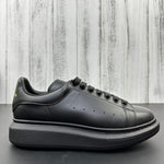 Alexander McQueen All Black Drip Sneakers