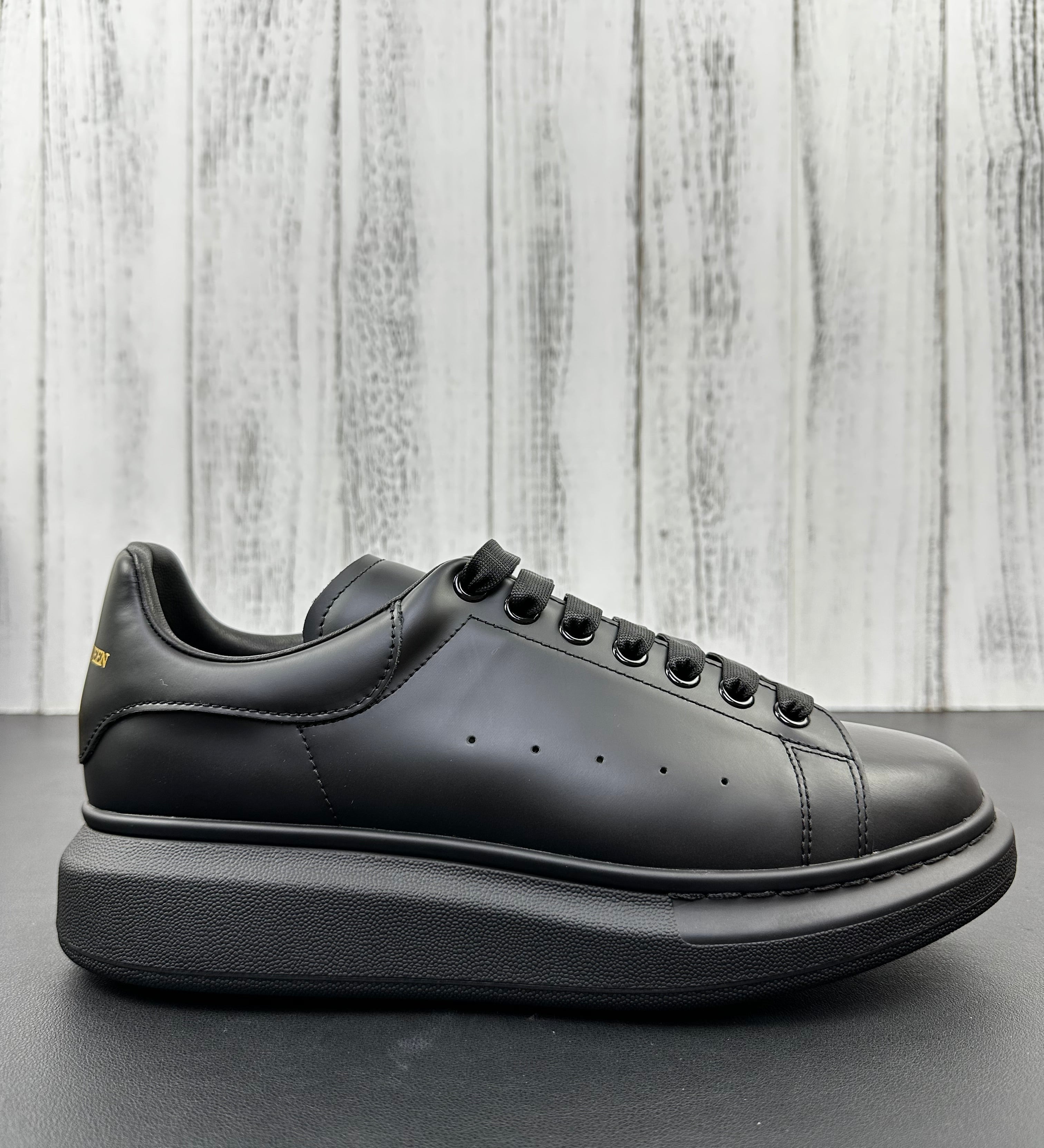 Alexander McQueen All Black Drip Sneakers
