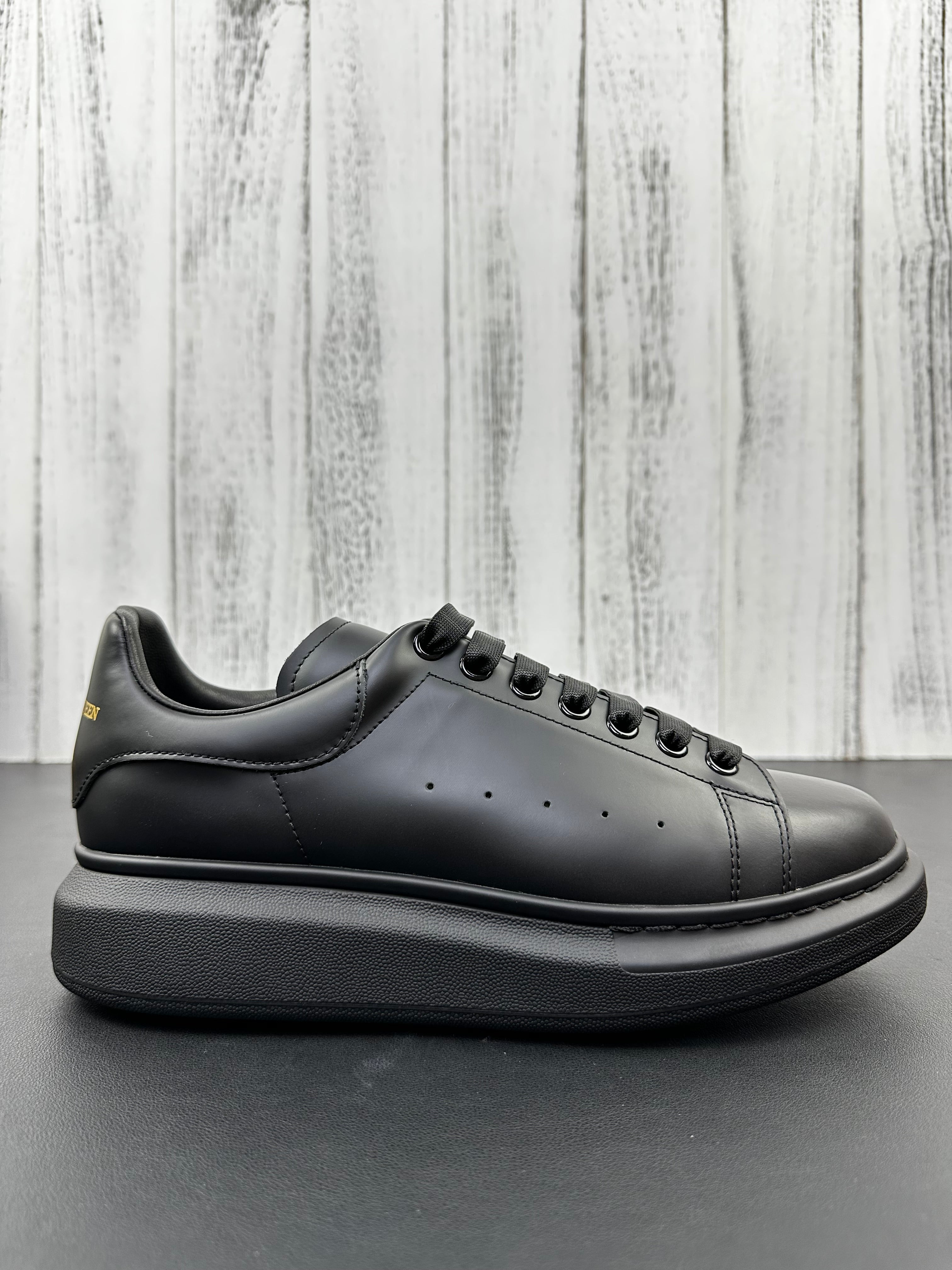 Alexander McQueen All Black Drip Sneakers