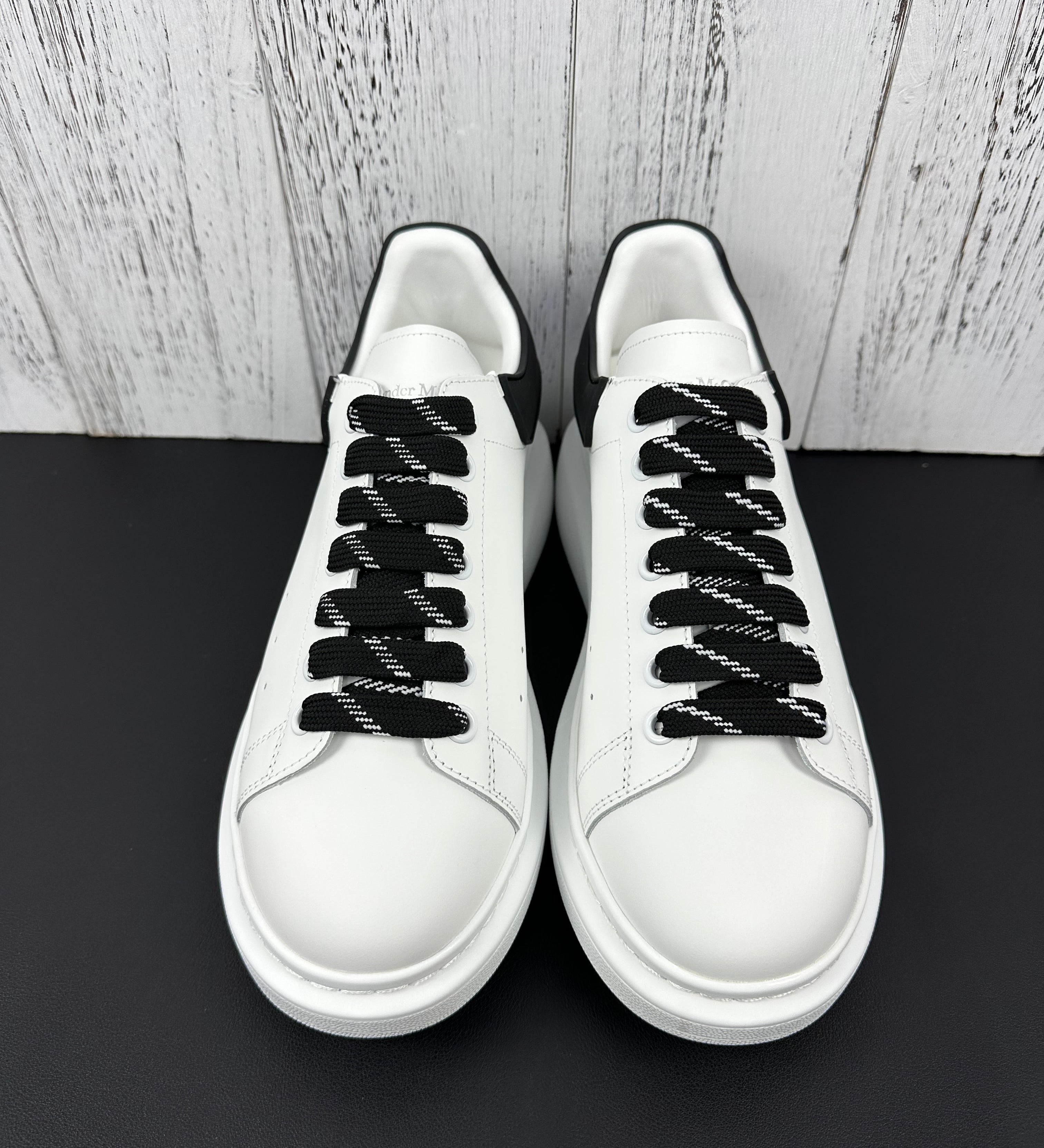 Alexander McQueen Black and White Drip Sneakers
