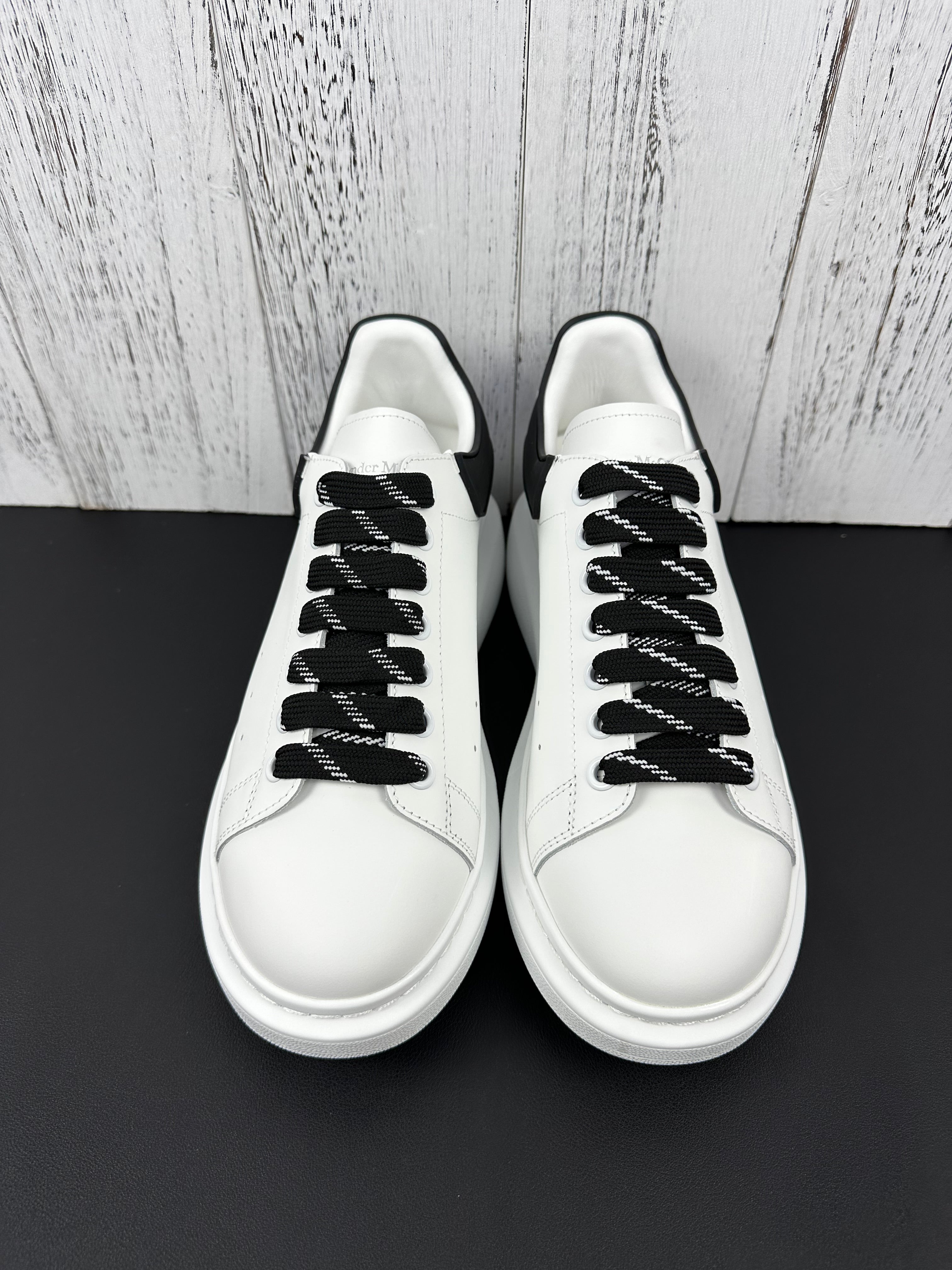 Alexander McQueen Black and White Drip Sneakers