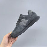 574 Cinzento Stone Island