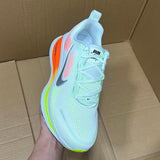 Vomero 18 Barely Green Hyper Crimson