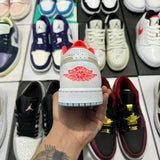 AJ1 Low White/Sesame/Flash Crimson
