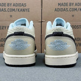 AJ1 Low Coconut Milk Black Muslin